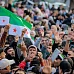 waving with syrian flags
